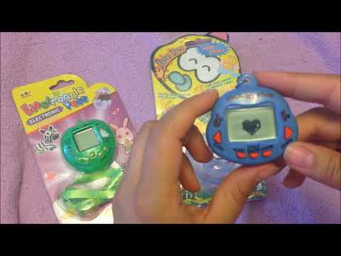 Видео: Обзор Dinkie Dino Tamagotchi