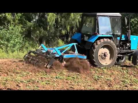 Видео: Дисковая борона БДФ-2,4 и МТЗ-82