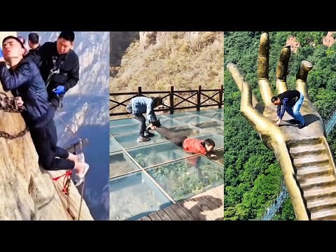 Видео: 😱Самая страшная стеклянная дорожка со стороны скалы😂Люди осмеливаются идти, удивительный китайский