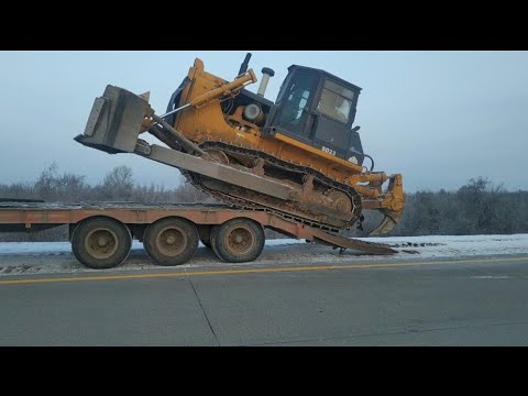 Видео: Погрузка на трал- Бульдозера shantui SD23 Buldozerni tralga chiqish jarayoni