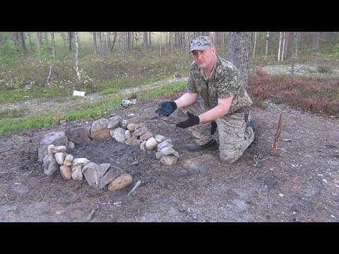 Видео: Таежный костер -  очаг. Оборудование стоянки.