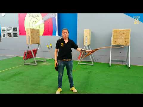 Видео: Как стрелять из традиционного лука