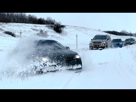 Видео: Слон и Моська. Дикая охота BMW на MINI Cooper