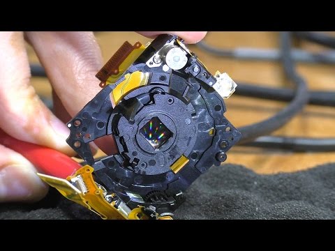 Видео: Ошибка объектива. Фотокамера Canon Ixus 105. РЕМОНТ
