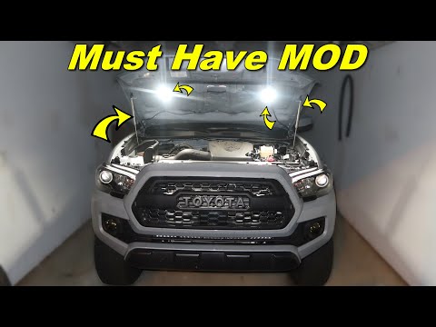 Видео: 2020 Toyota Tacoma СТОЙКИ КАПОТА + ФАРЫ (руководство по установке)
