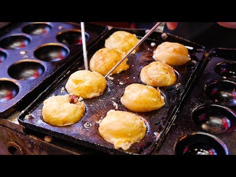 Видео: Японская уличная еда - Ниндзя Такояки черные шарики осьминогов Osaka Япония