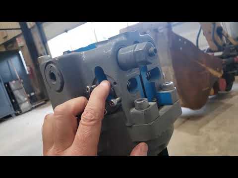 Видео: Как работает гидромотор поворота экскаватора / привод поворота