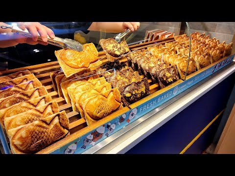 Видео: Лучшая уличная еда в Малайзии, жареные бананы оптом, Pancake Master, хлеб в форме рыбы