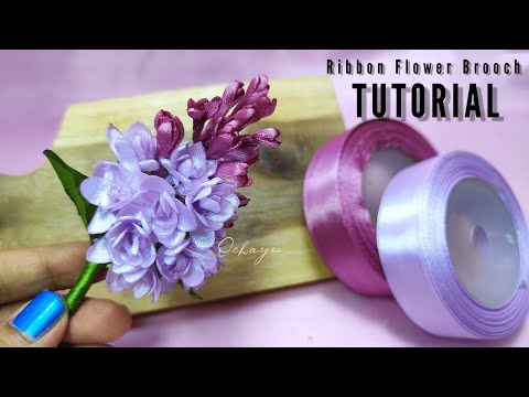 Видео: DIY/как сделать цветок из атласной ленты легко/брошь сиреневый цветок