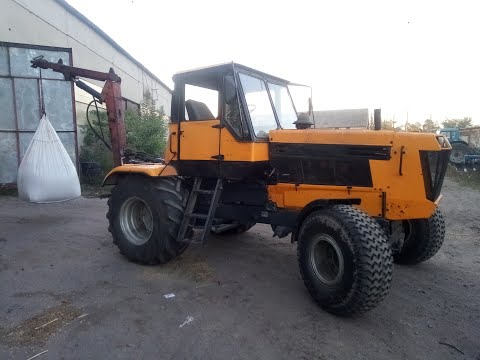 Видео: ДТ-75 на колесах.  Робота з реверсом - це задоволення.