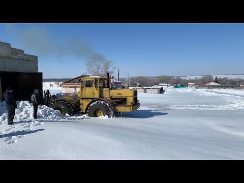 Видео: К-700А «Кировец» ПРЕОДОЛЕВАЕТ ВЕСЕННИЕ СУГРОБЫ. ПОЛНОЕ ВИДЕО, ОРИГИНАЛЬНЫЙ ЗВУК.