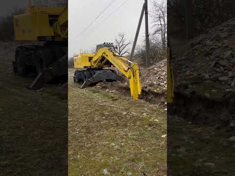 Видео: Экскаватор Ек 12 копка траншей