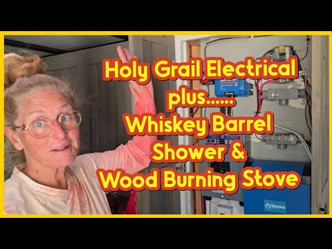 Видео: Священный Грааль: электричество плюс душ из бочки для виски и дровяная печь!
