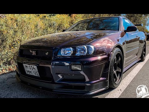 Видео: Унижающий современные спорткары старый Nissan Skyline GT-R V-SPEC