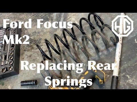 Видео: Ford Focus Mk 2: замена задней пружины