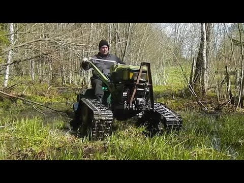 Видео: В лесу вне дорог на тяжелом мотоблоке на гусеницах.
