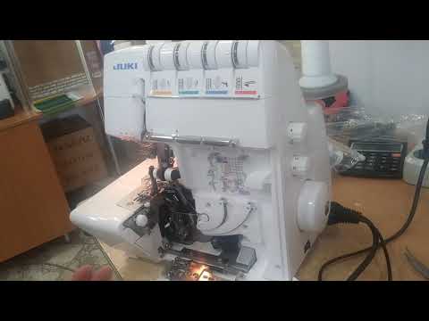 Видео: Заправка пятиниточного оверлока JUKI MO-75e