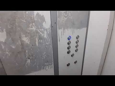 Видео: Ужасное общежитие! Новый лифт (НЛМ 2014) Центральный в серии дома : 1-447с54