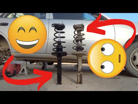 Видео: Как заменить задние стойки на Toyota Corolla