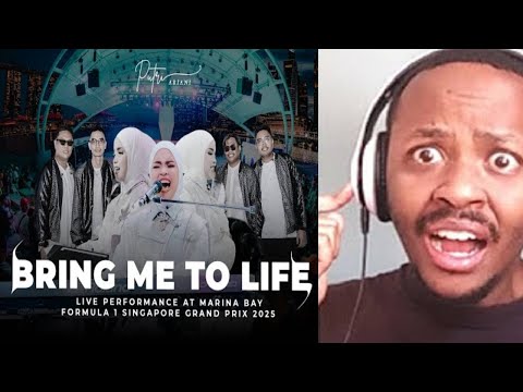 Видео: Путри Ариани исполняет кавер на песню Evanescence «BRING ME TO LIFE» (выступление F1 в Сингапуре)...