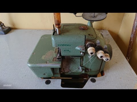 Видео: Промышленный оверлок Текстима 8514.