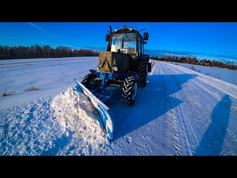 Видео: МТЗ-82.1. Местами перемело дорогу, пришлось разгребать по быстрому и кое-где ее расширить.