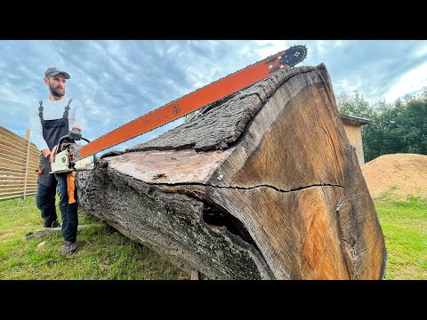 Видео: Stihl ms 880 150 см против большого дубового бревна