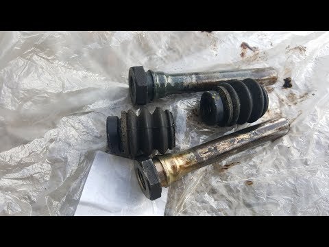 Видео: Хонда Одиссей RA6 Почему клинят колодки, тех обслуживание суппорта