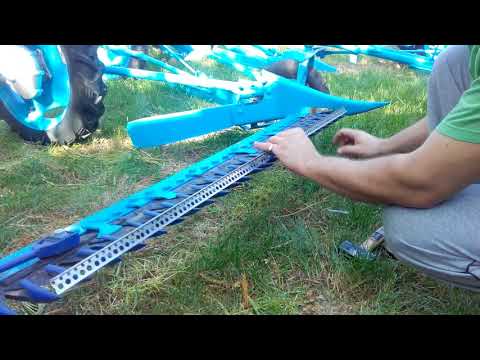 Видео: Регулиране режещият апарат на BCS