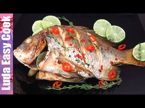 Видео: РЫБА ЗАПЕЧЕННАЯ В ДУХОВКЕ с лимоном и тимьяном на праздничный стол Необычно и Вкусно!