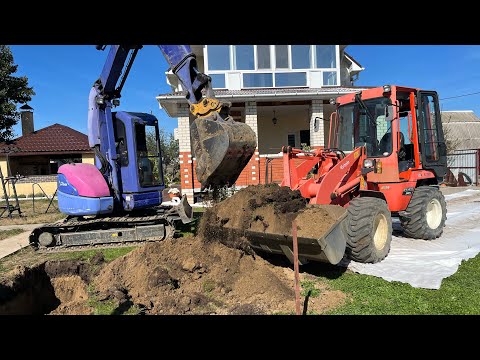 Видео: Kubota и Komatsu