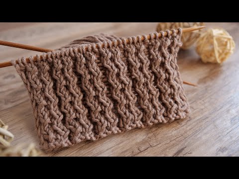 Видео: Резинка с танцующими петлями спицами 💃 Rib with dancing stitches knitting pattern