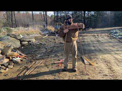 Видео: Установка обрешеточных досок для создания каркасов для строительства стен из сухого камня