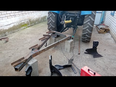 Видео: Делаем плуг на т 40