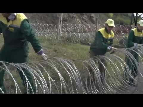 Видео: Егоза Монтаж, установка колючей проволоки, производство ООО ПГ Кайман