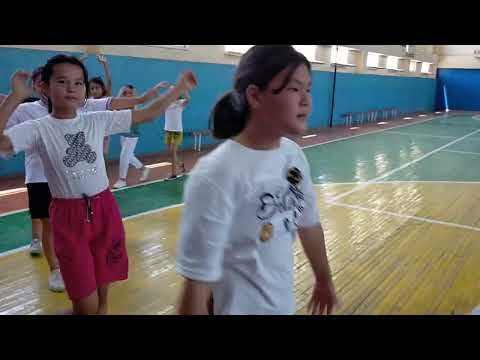 Видео: "Жеңіл атлетика. Бір орыннан ұзындыққа секіру" 5 А сынып ашық сабағы. Д-ш пән мұғалімі Байбакова Р.