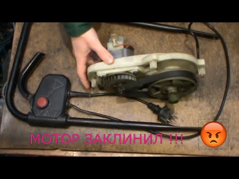 Видео: Заклинил мотор в газонокосилке Einhell GC EM 1030