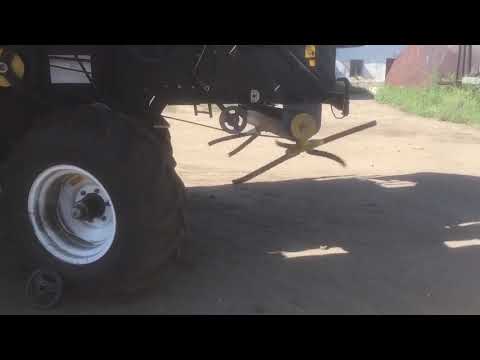 Видео: Разбрасыватель соломы Био-тилл РС-1500 на комбайне Акрос.