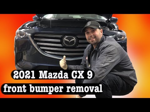 Видео: Снятие переднего бампера Mazda CX 9 2021 года