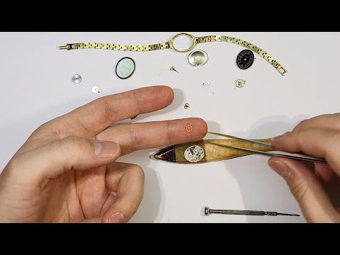 Видео: Обслуживание наручных часов Чайка 17 камней