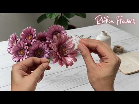 Видео: Потрясающий трюк 🤯 Цветы герберы из ленты | Простой мастер-класс по созданию цветка герберы