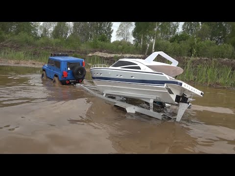 Видео: ПРИЦЕП ДЛЯ КАТЕРА ... Спуск катера через гряземес!