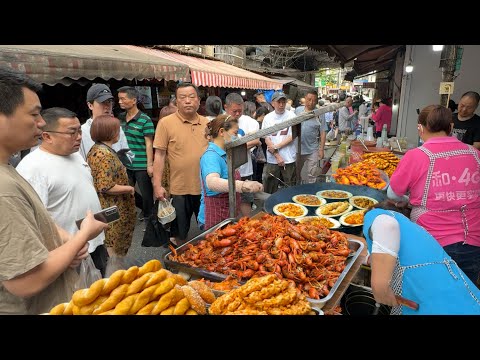 Видео: Ухань, Китай: Две стороны вкуса — от простого рынка до изысканной уличной еды, жизнь и яркие закуски