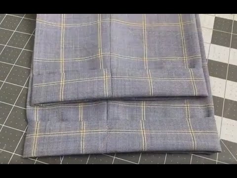 Видео: Как подшить брюки с манжетой.