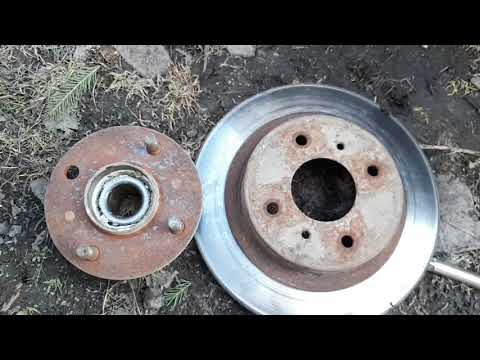 Видео: Замена задней ступицы Nissan primera p11