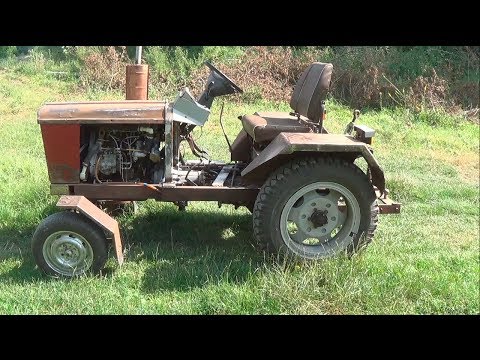 Видео: Обзор мини-трактора - главное захотеть и все получится.