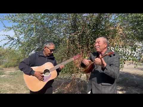 Видео: "Гүл-гүл жайна" Халық әні. Орындағандар: Е.Ағырай, Ш.Жанеділ.