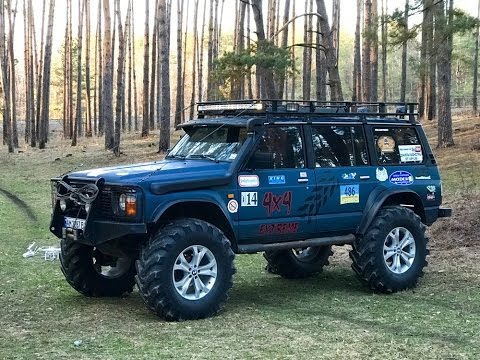 Видео: Полный обзор подготовленный Ниссан Патрол 60 с портальными мостами от лапландера. Реактивный.