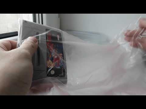 Видео: Посылка с Aliexpress (защитные чехлы для SFC, SNES-EUR картриджей)