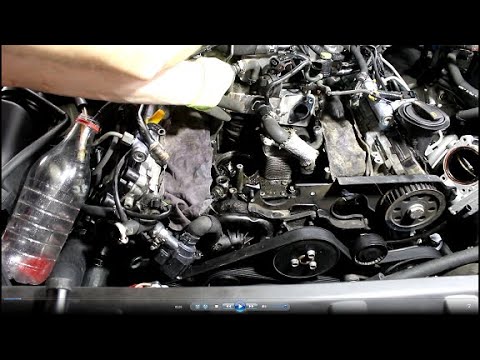 Видео: Замена прокладок теплообменника двигателя на АУДИ Q7 2008 AUDI Q7 3,0 дизель 2часть